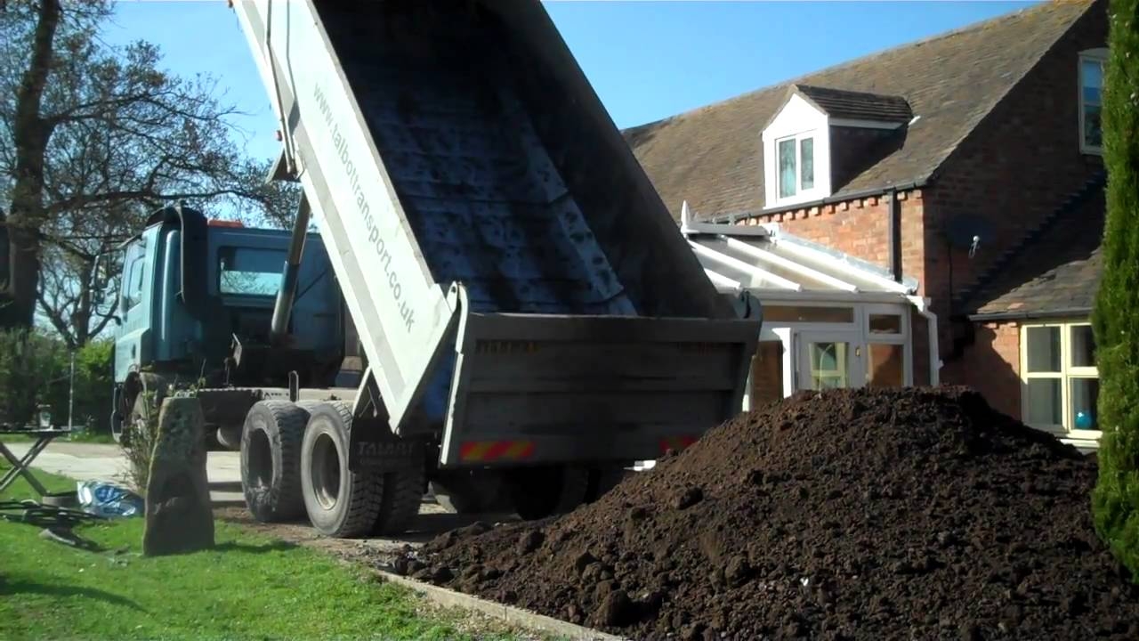 UNLOADING 10 TONS OF TOP SOIL YouTube